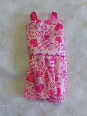 A - 3 mini Barbie dresses in various colors